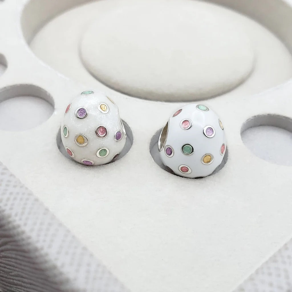 EGG WITH COLORED DOTS
